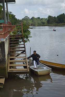 A woman going to town in her boat.