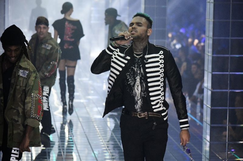 Rapper Chris Brown skips Paris hearing over rape accusation