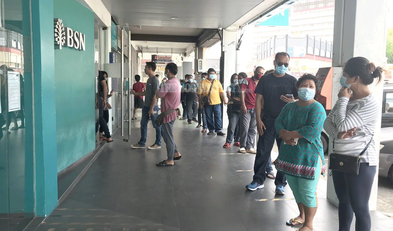 Busy day at bank as dozens come to check BPN payouts 