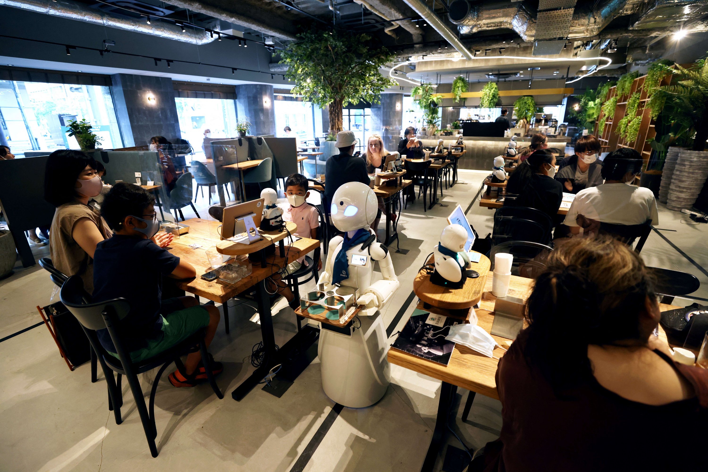 Tokyo robot cafe offers new spin on disability inclusion