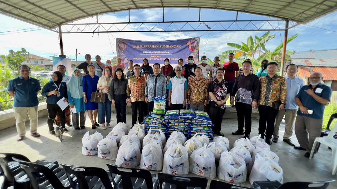 Families from 3 Kuching villages receive food packets sponsored by ...