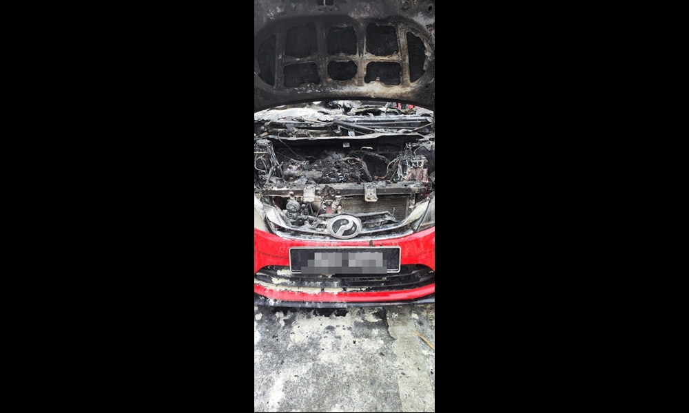 Car partially destroyed after engine bay catches fire at Jalan Kpg Haji Baki