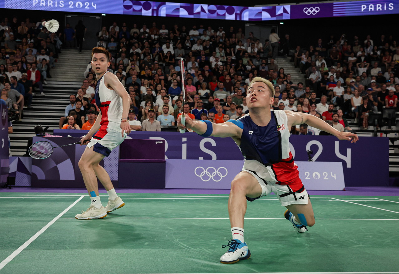 Paris 2024: National shuttlers Aaron-Wooi Yik escape early setback to prevail against English pair